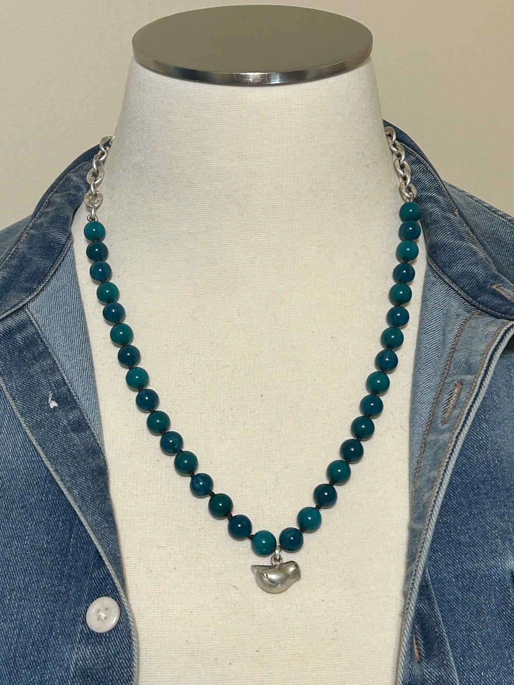 FOSSIL HAND TIED GLASS BEAD NECKLACE WITH BIRD PENDANT